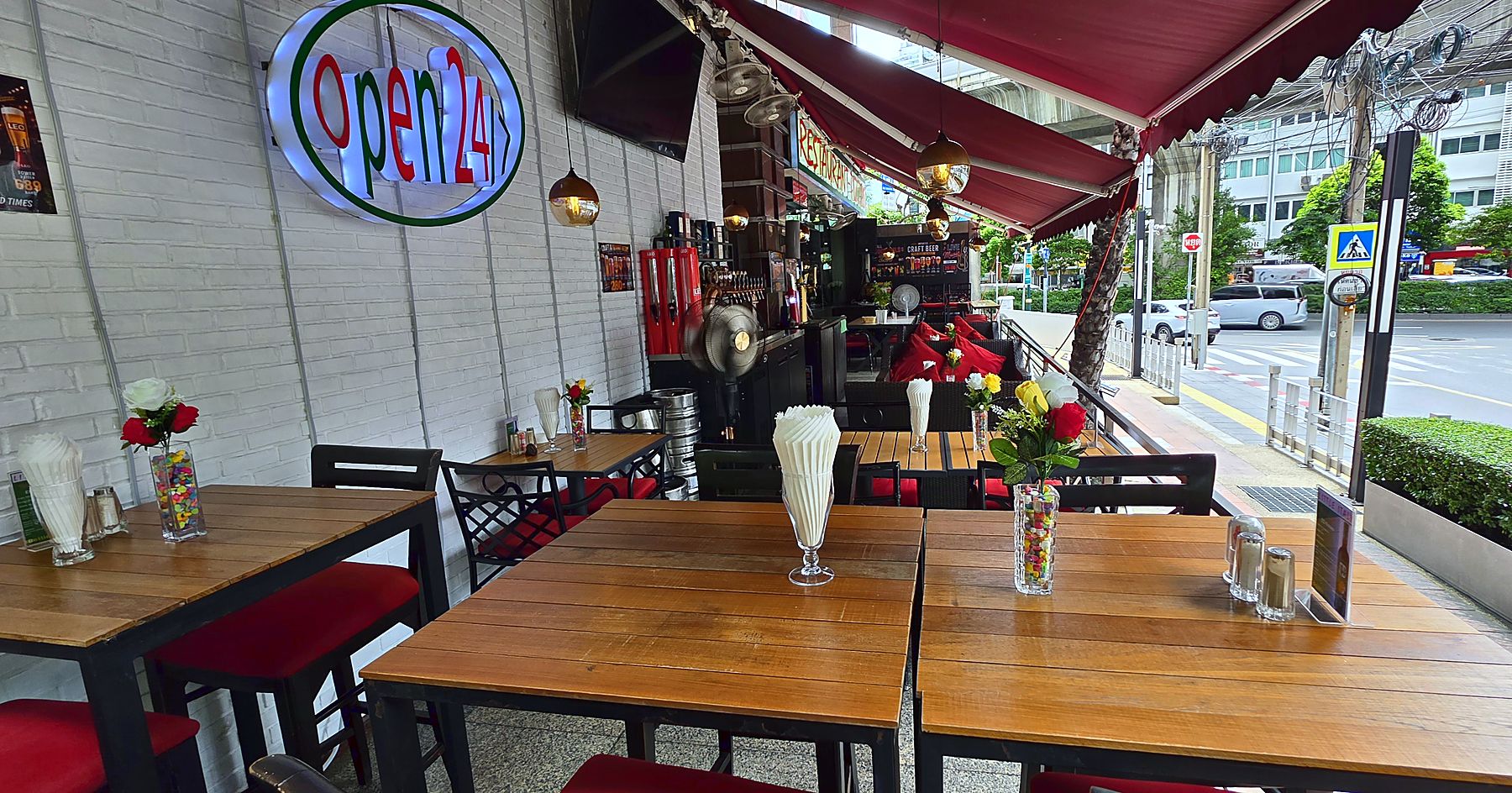 Street-side tables under the awning